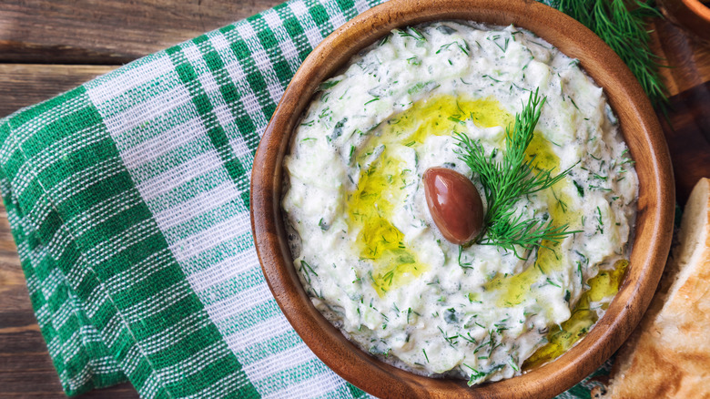 Bowl of white dip with dill