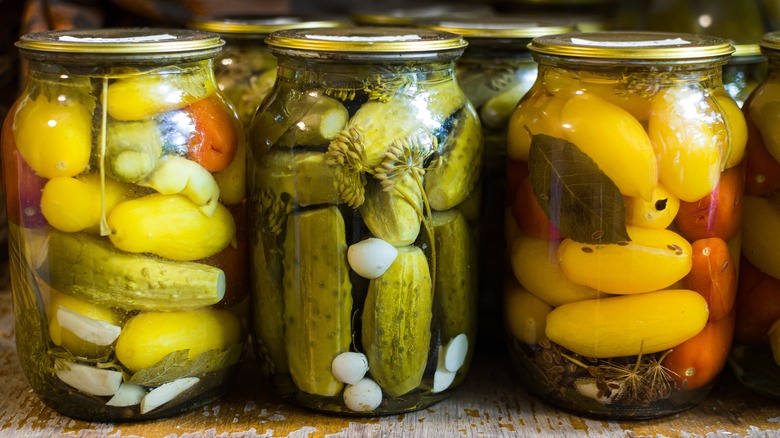 Pickled vegetables in glass jars