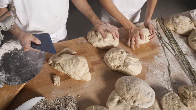 Portioning out dough into loaves