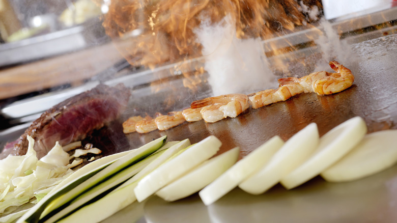 meat and veggies on hibachi grill