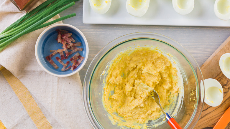 mashed egg yolks in bowl