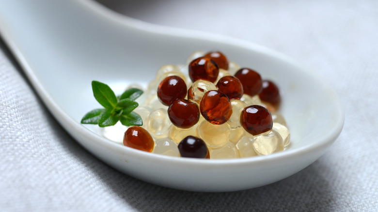 pearls of olive juice and agar