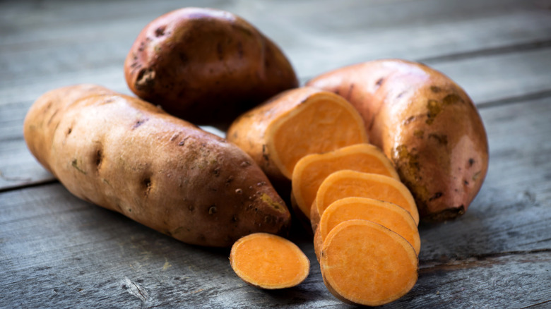 Sweet potatoes on wood