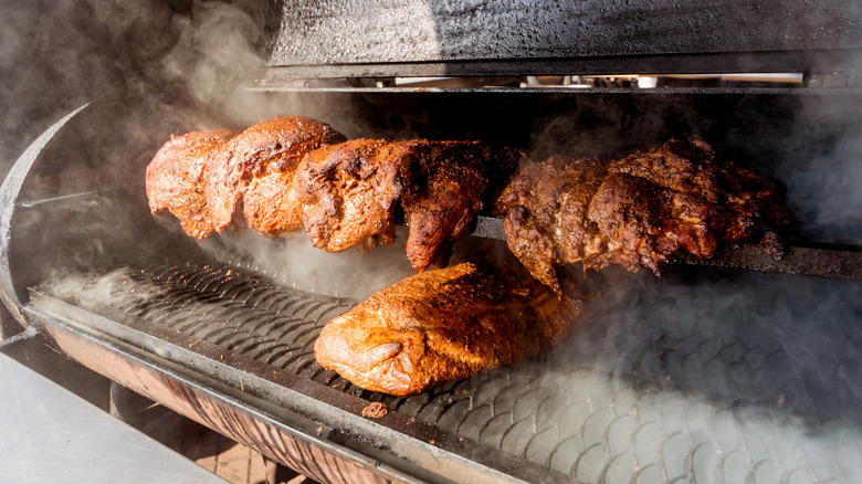 a smoked brisket on the grill