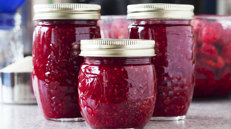 Raspberry jam in mason jars