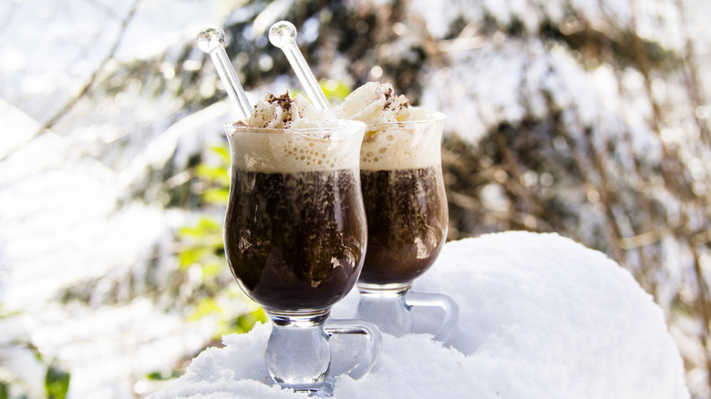 2 Irish coffees in outdoor wintry scene