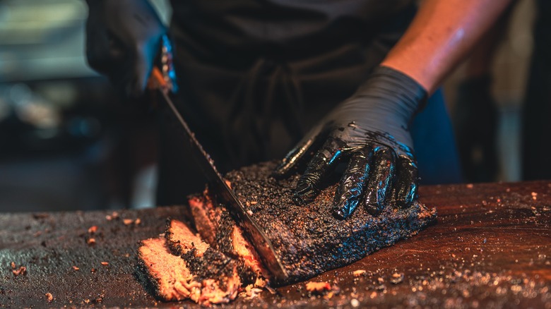 chef slicing beef brisket