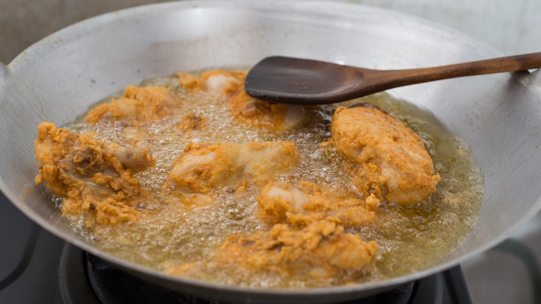 frying chicken in oil