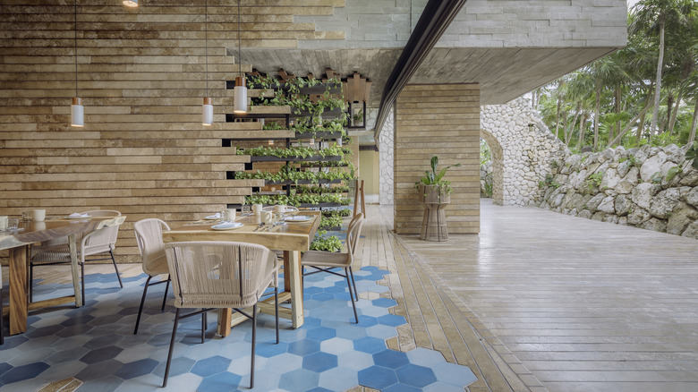 Restaurant interior of wood and plants