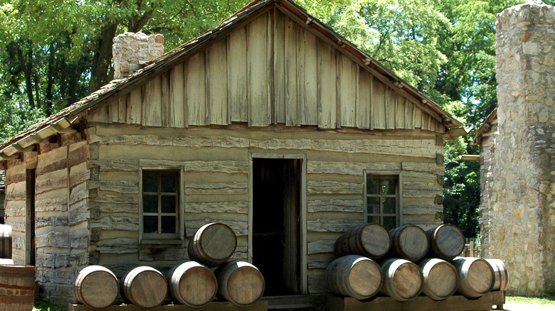 pioneer frontier cabin with whiskey barrels 