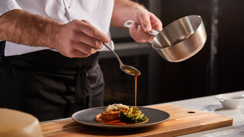 Chef plating a dish