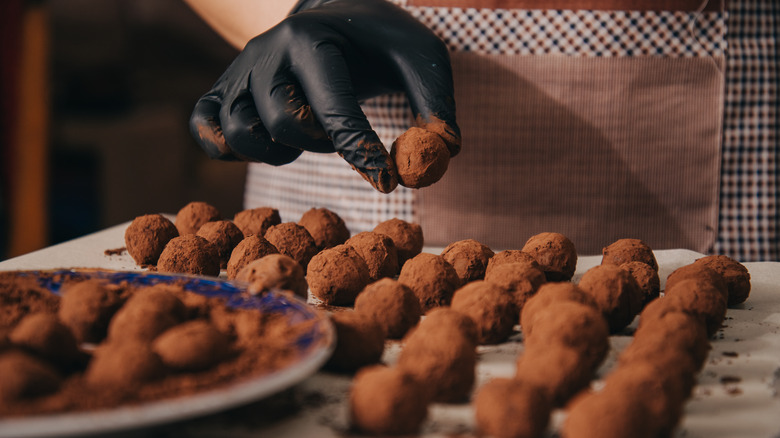 hand making chocolate truffles