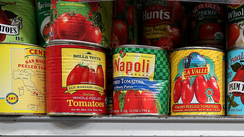 Tomato cans on shelf