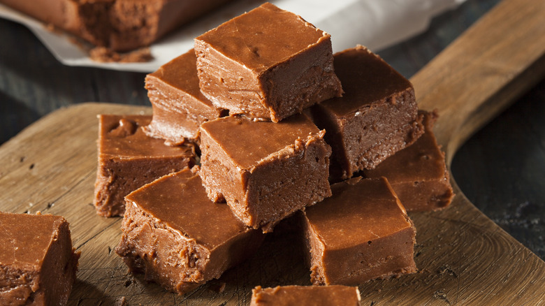 Pieces of fudge on a wooden board