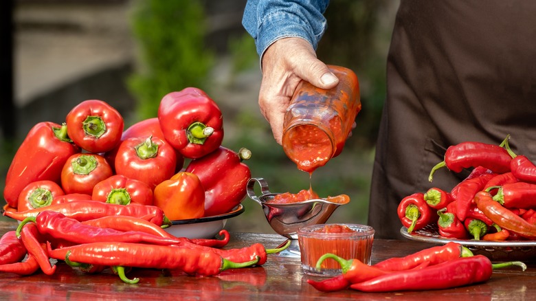 man making paprika paste