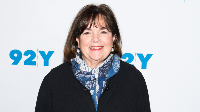 Ina Garten smiles on a red carpet