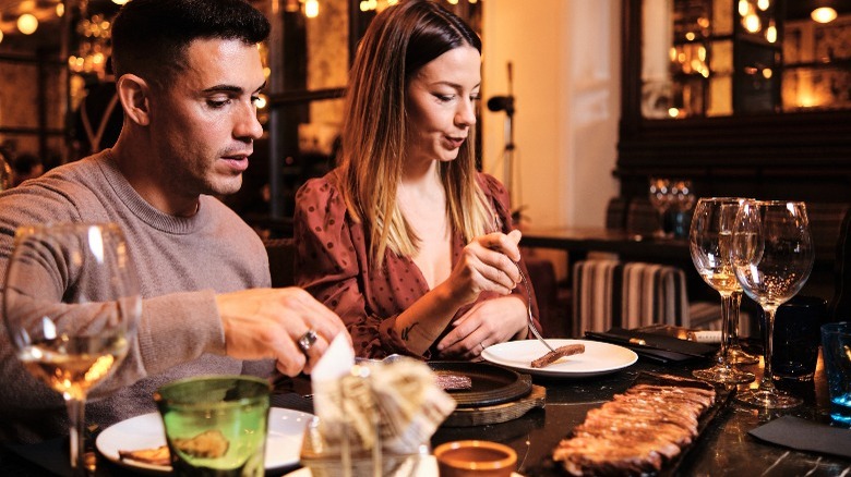 Couple enjoying restaurant meal