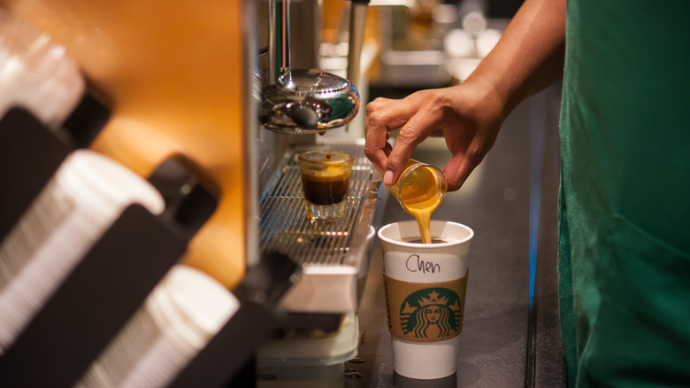 Barista making drink