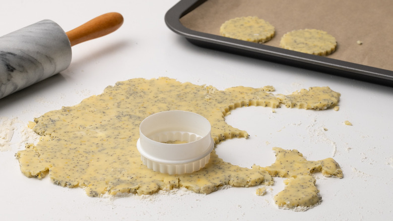 cutting out cookies from dough