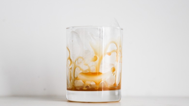 Glass with ice and caramel