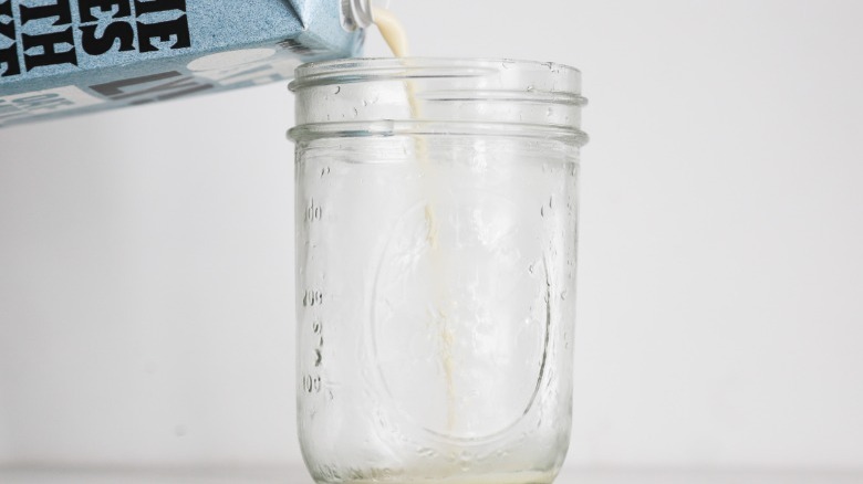 pouring milk into glass