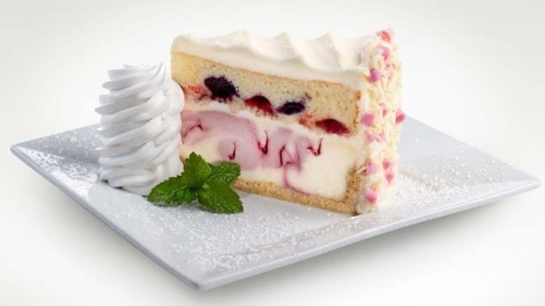 Slice of Cheesecake Factory's Triple Berry Cheesecake on a plate