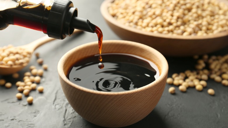 pouring soy sauce