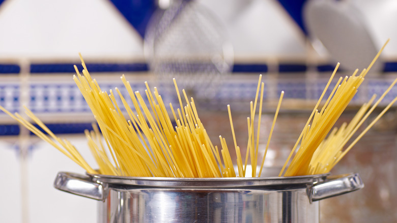 pasta sticking out of pot