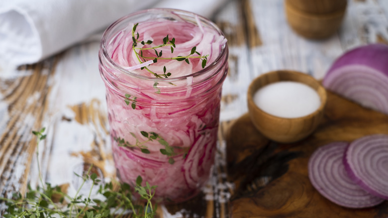 red pickled onions in jar