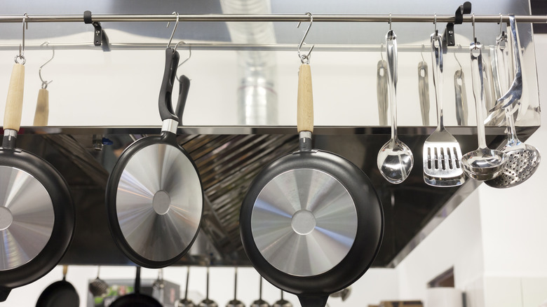 Frying pans and metal ladle