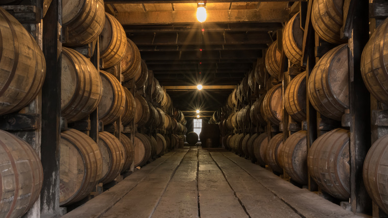 Whiskey barrels aging in rickhouse