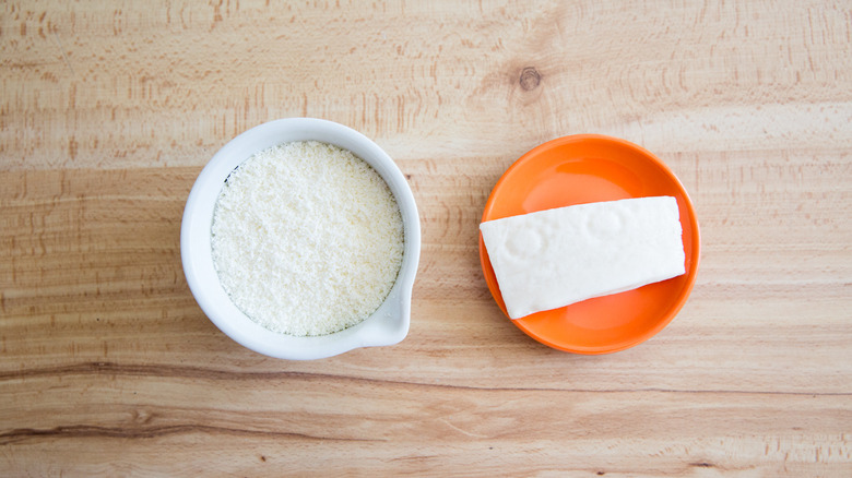 grated pecorino cheese on table