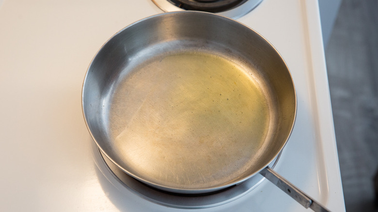 olive oil heating in pan