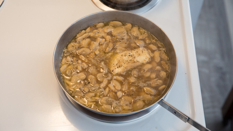 beans simmering in stovetop pan