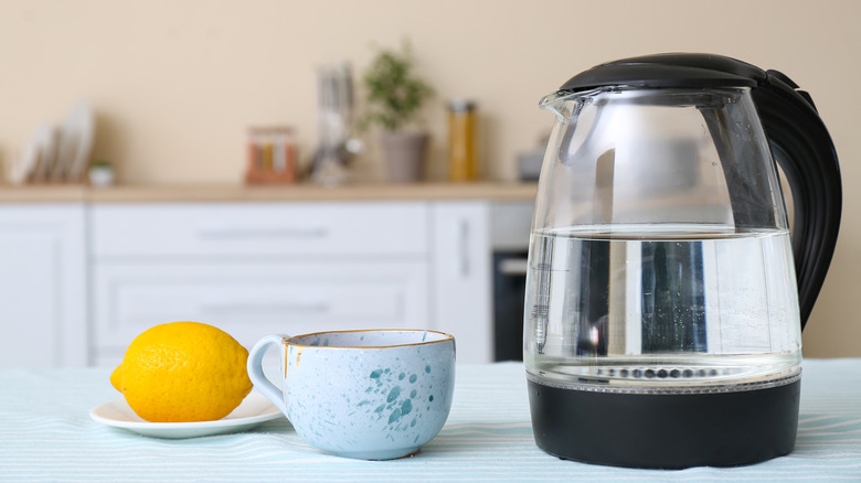 Lemon, cup, and kettle