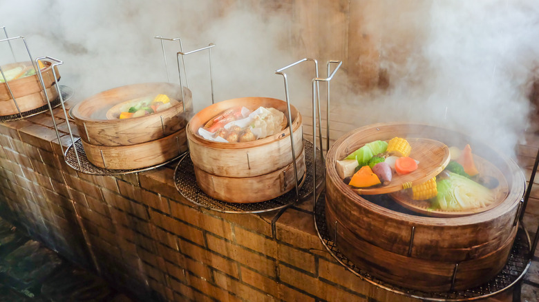 Hell ovens loaded with steamer baskets