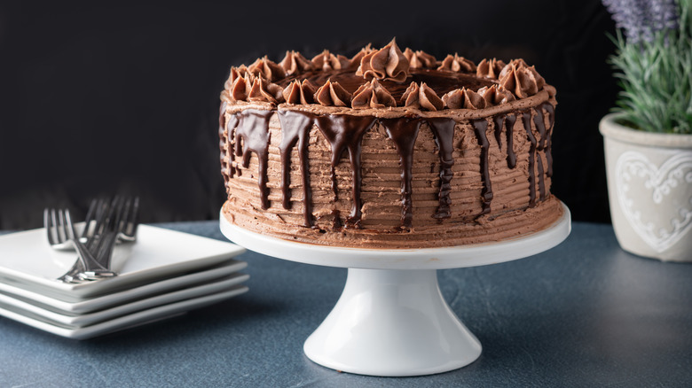 Frosted cake on a stand