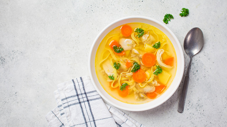Chicken soup in bowl 