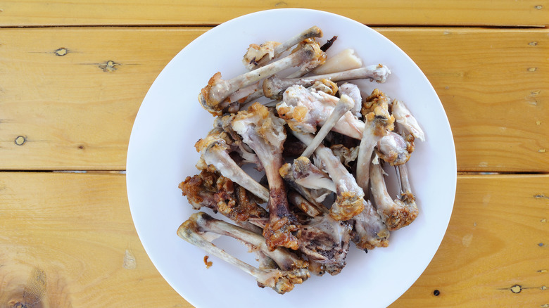 Chicken bones on a plate