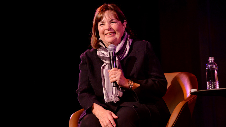 Ina Garten smiling with microphone