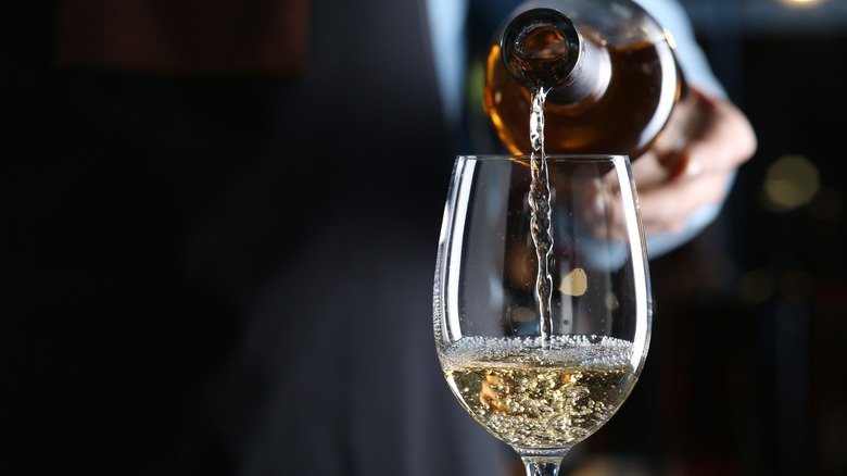 pouring white wine