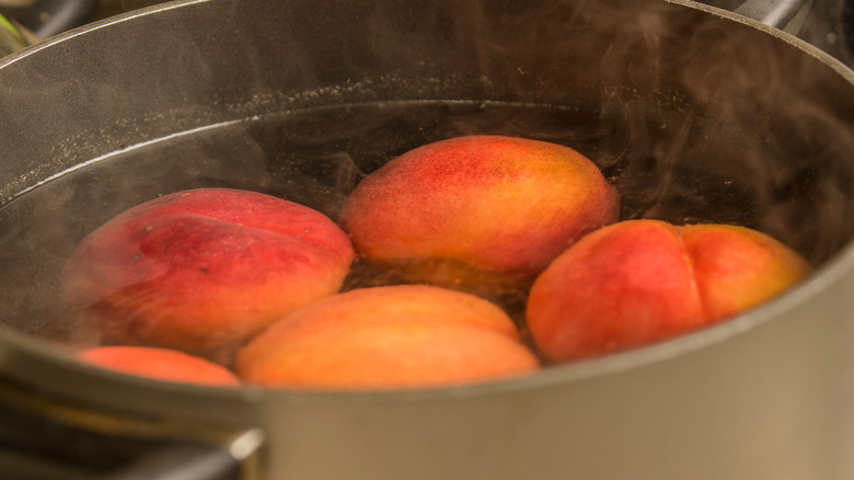 peaches simmering in pot