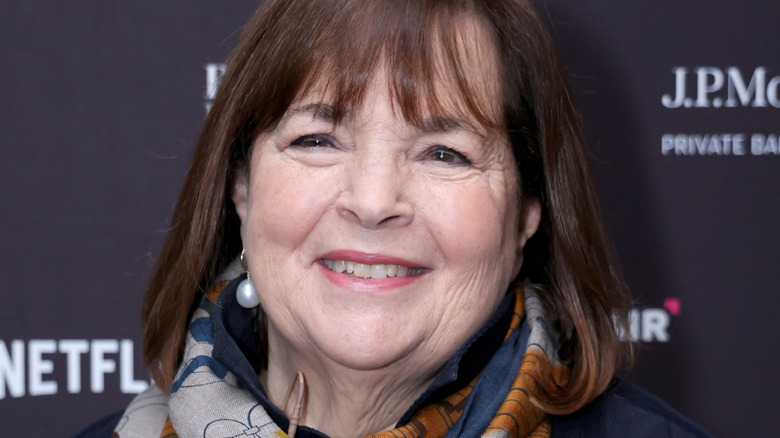 Ina Garten smiling in scarf and pearls