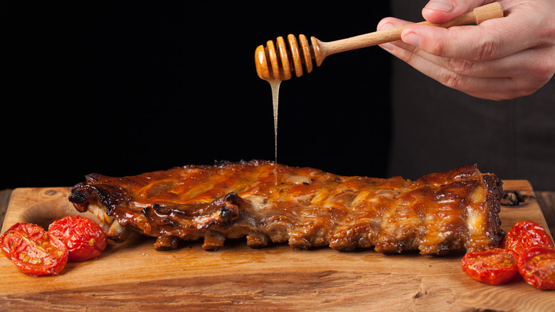 Honey being dripped on ribs