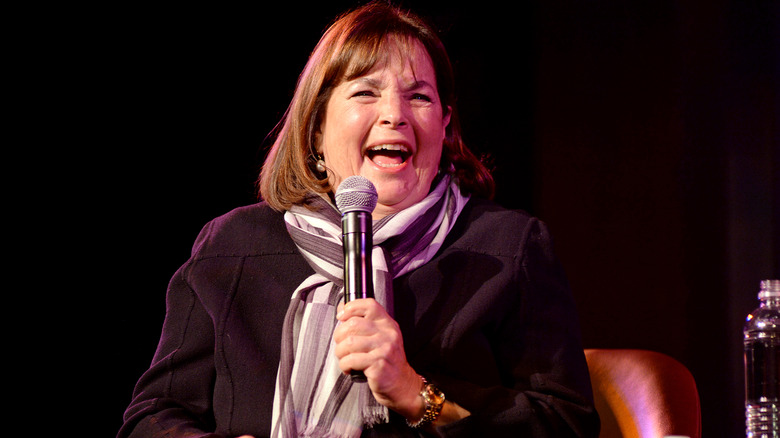 Ina Garten laughing with microphone