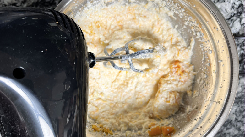 mixing ricotta squash mixture