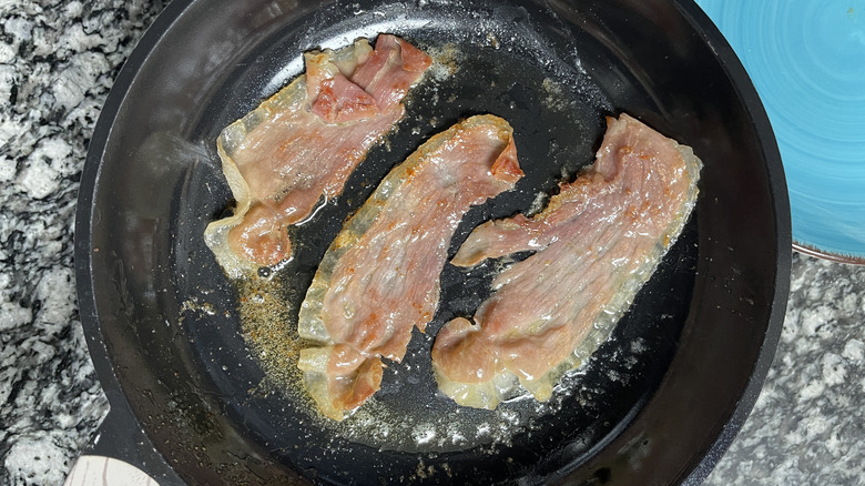 cooking pancetta in skillet