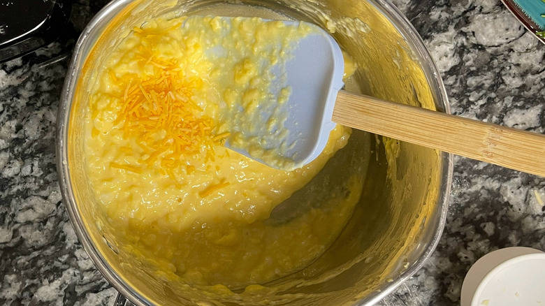 stirring cheese into egg mixture