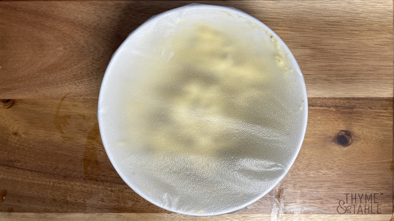 plastic wrapped butter in bowl