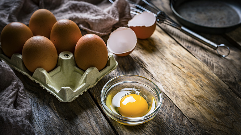 Broken egg on counter